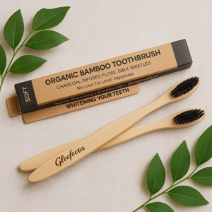 “Eco-friendly bamboo toothbrush with charcoal bristles and natural wooden handle”