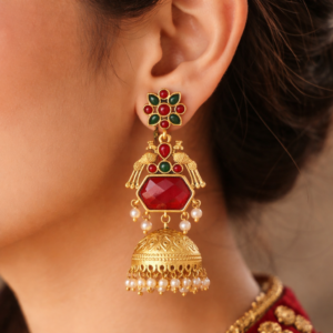Traditional Kashmiri jhumka earrings with red green stones and antique gold finish