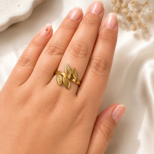Gold leaf adjustable ring for women with elegant minimalist design by Gleefecta on neutral aesthetic background.